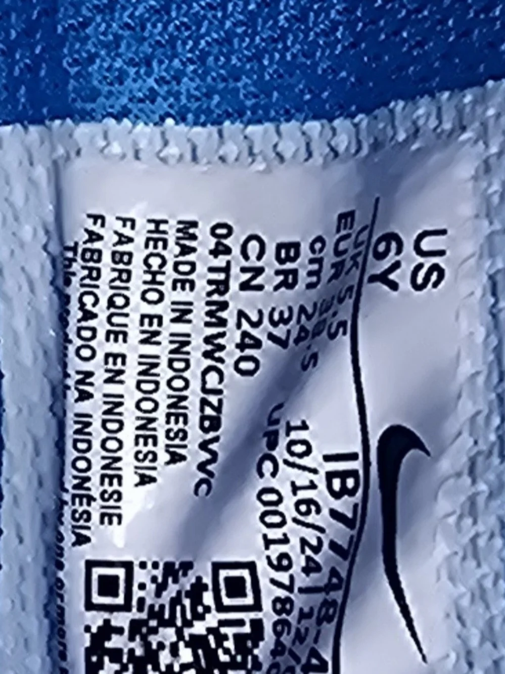 Nike Kids Blue Sneakers with Yellow Swoosh